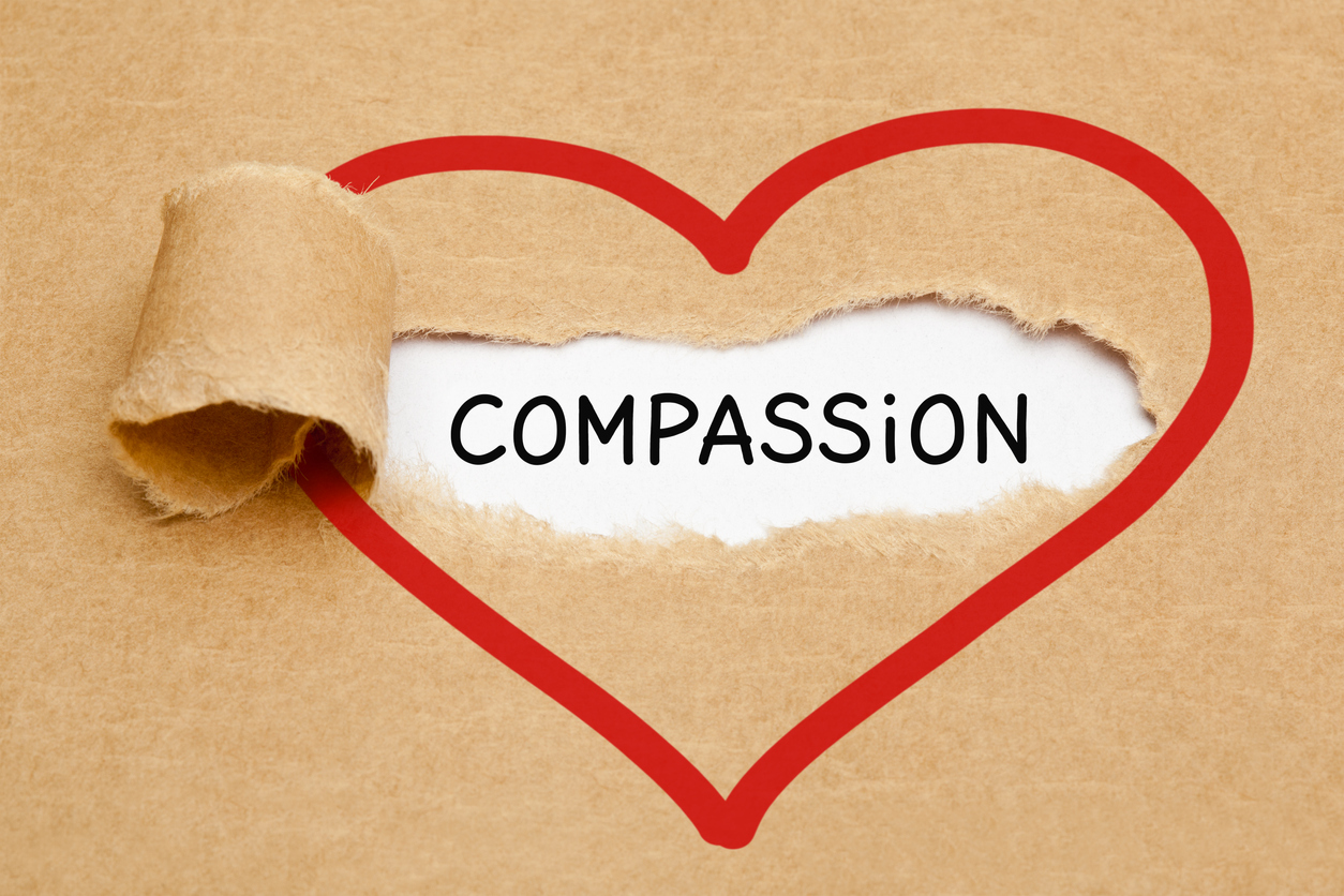 Photo of the word compassion as this blog is about compassionate leadership