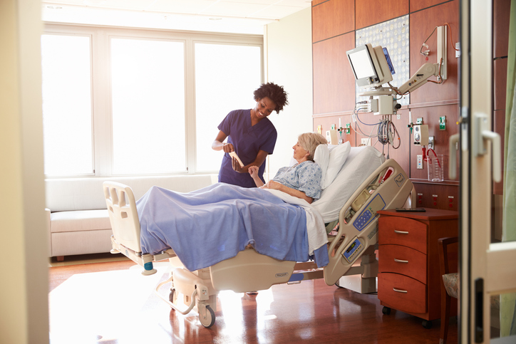 Photo of Agency Nurses Helping a Patient