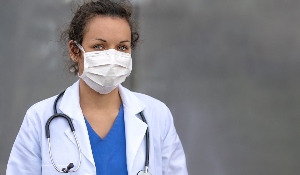 A photo of a doctor wearing a mask